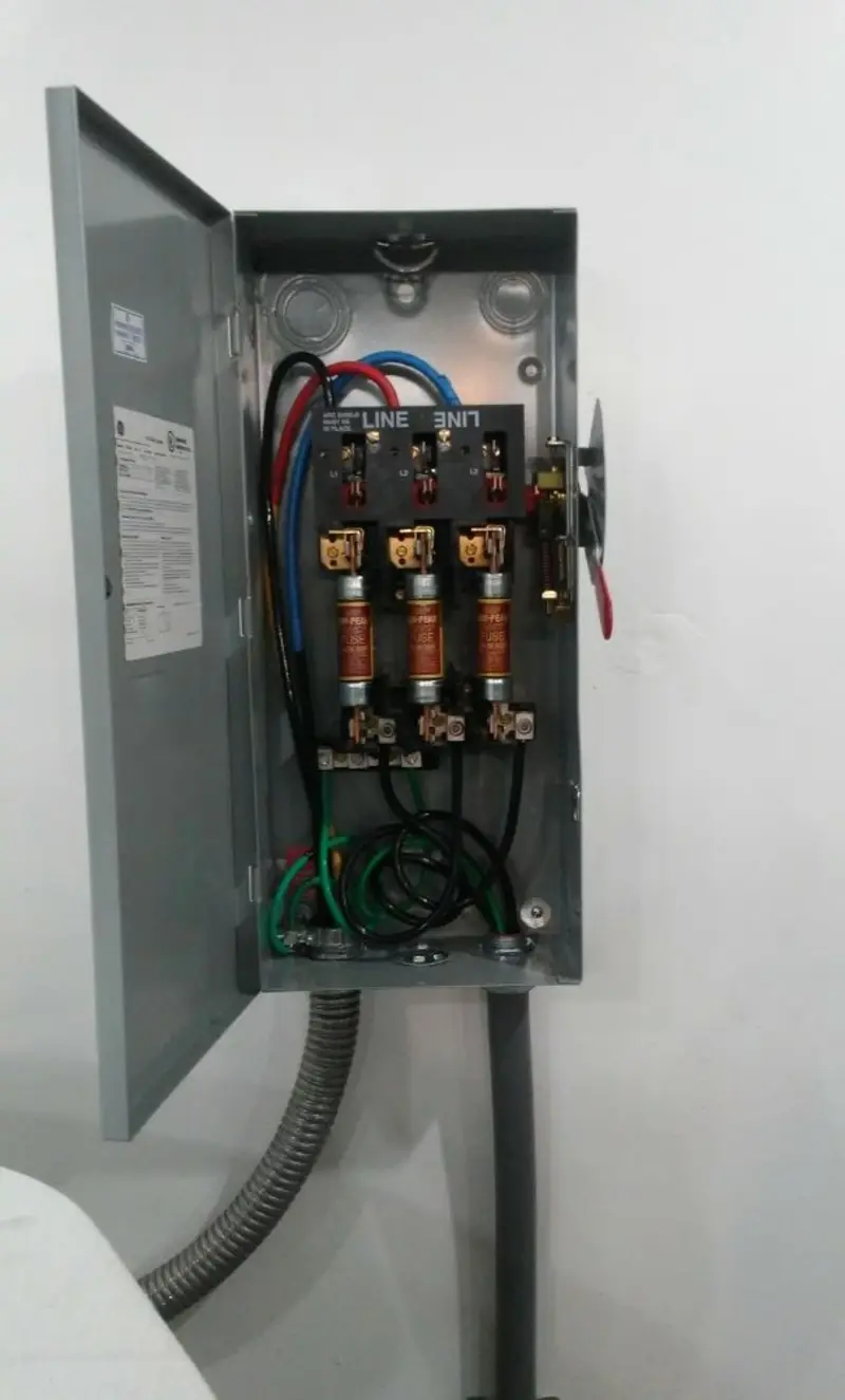 Three-phase disconnect switch installed for Smoke Detector Installation in Tarrant